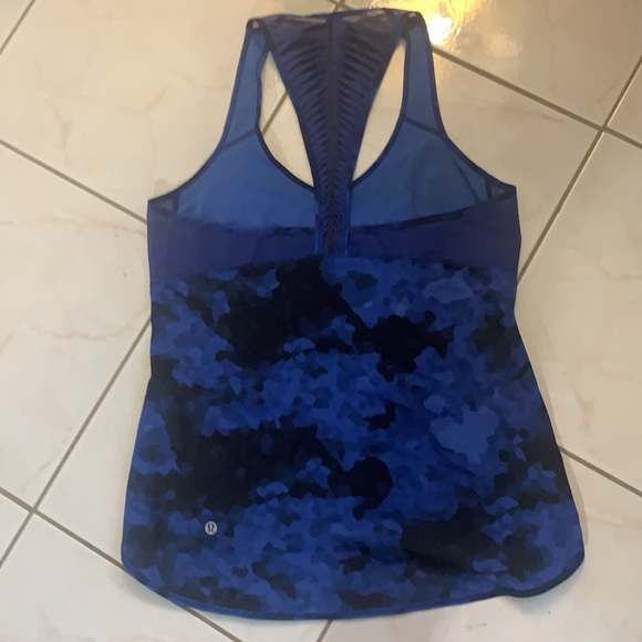 Lululemon racerback tank, delicate design down the back with reflective strip. - Picture 4 of 4